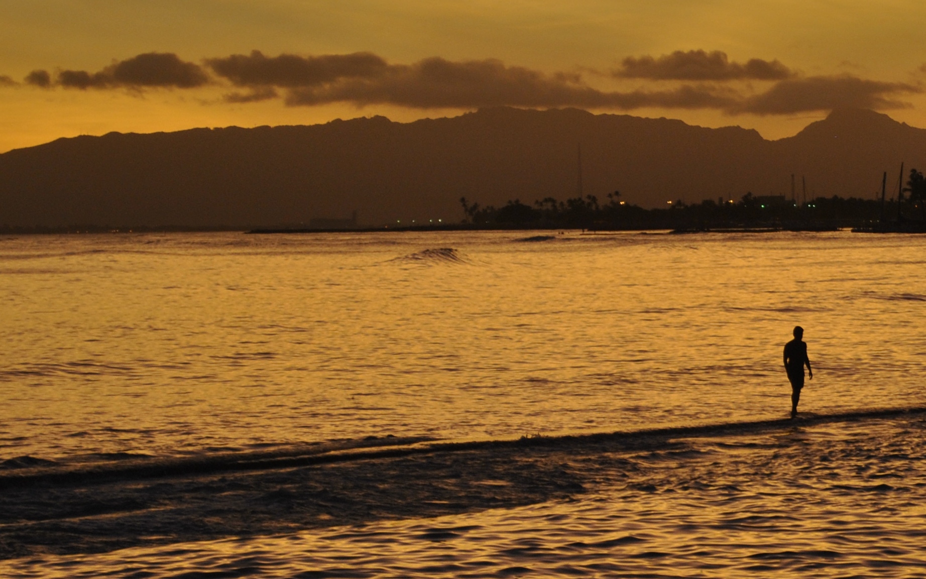 Man walks alone on water