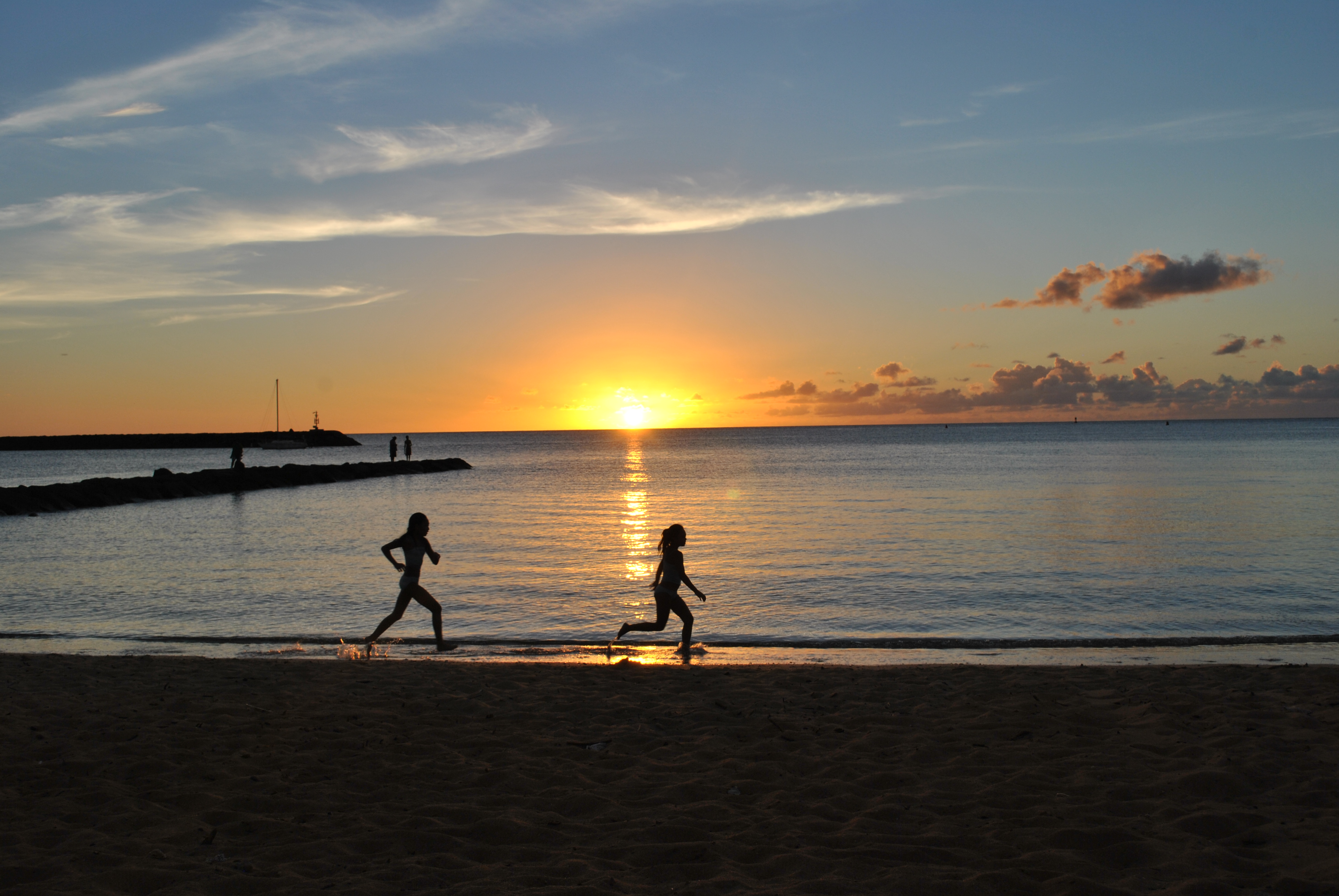 children running on beach
